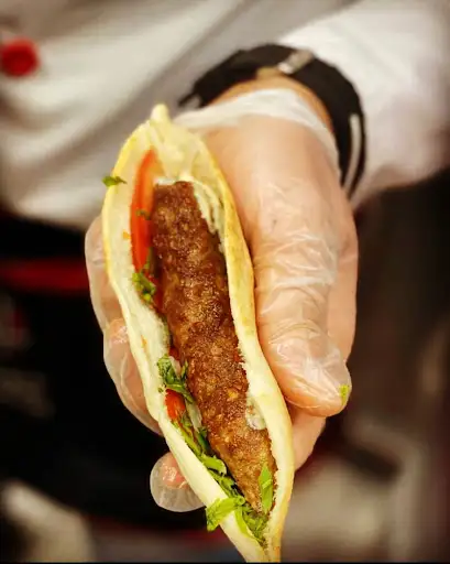 مطعم شاورما وفطائر حسن